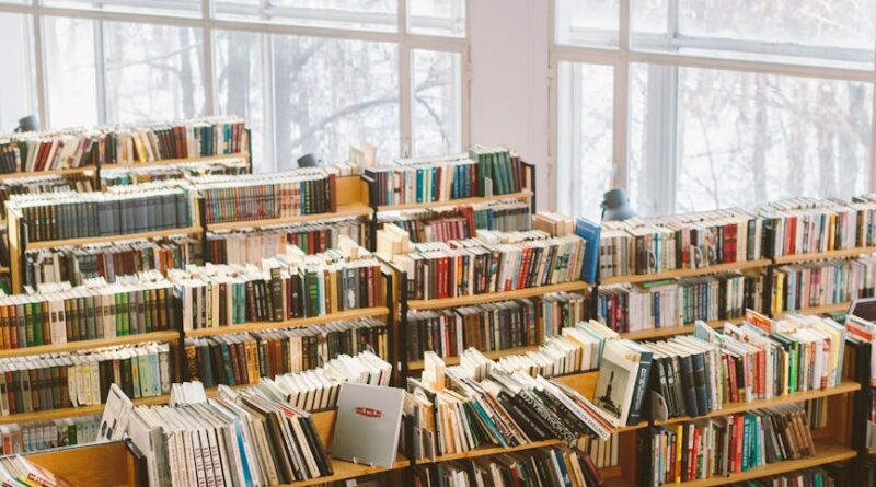 books on brown wooden shelf