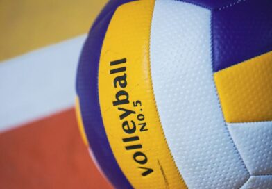 close up of volleyball on indoor court