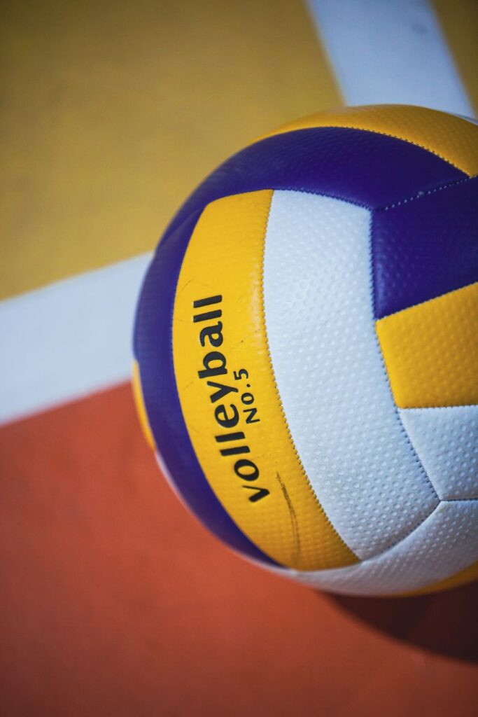 close up of volleyball on indoor court