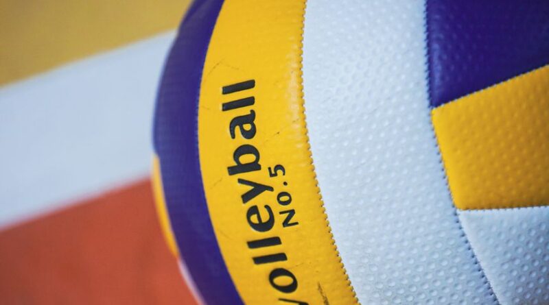 close up of volleyball on indoor court